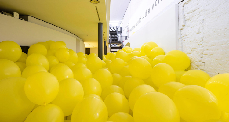 Yellow balloons in the Martin Creed Exhibition.