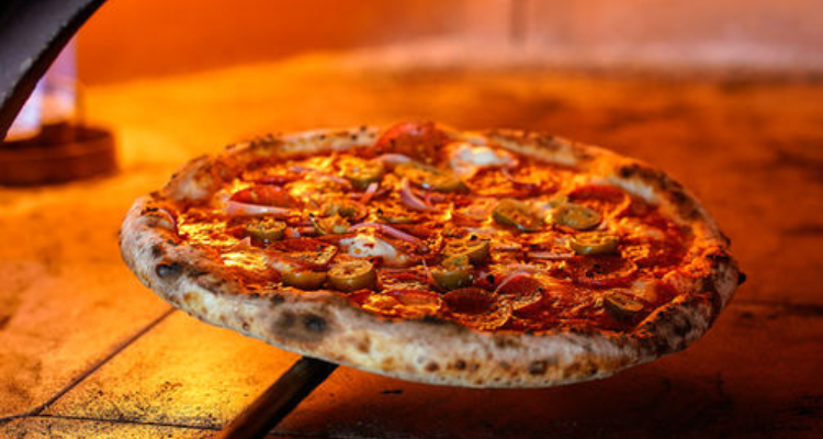 Pizza in the oven at Sanco.