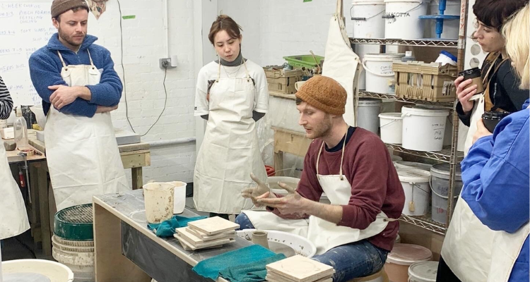 People at a pottery class at 7 Spot Manchester.