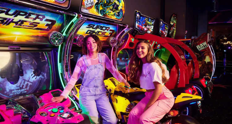 Girls at the Hollywood Bowl arcade. 