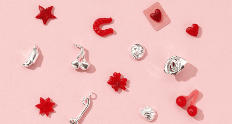 Collection of charms at Posh Totty Designs.