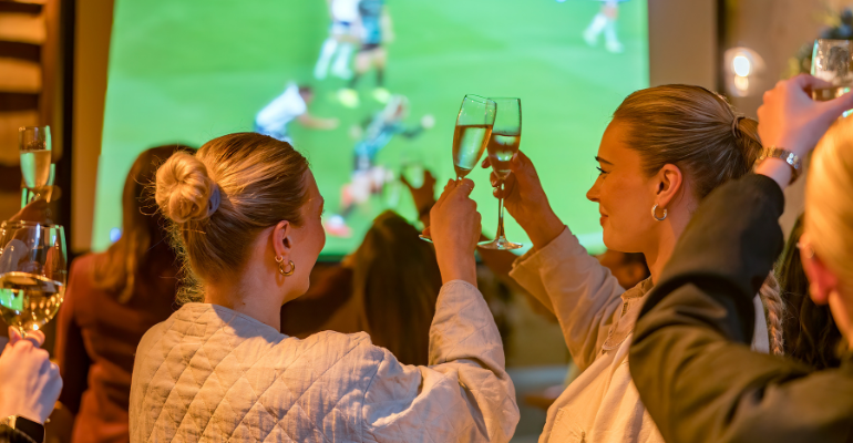 People watching football.