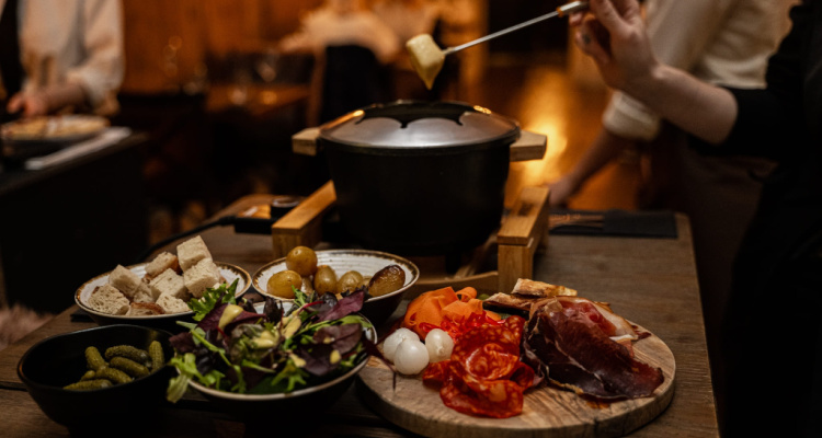 Fondue in front of an open fire at Fire and Fromage in London on the Southbank.