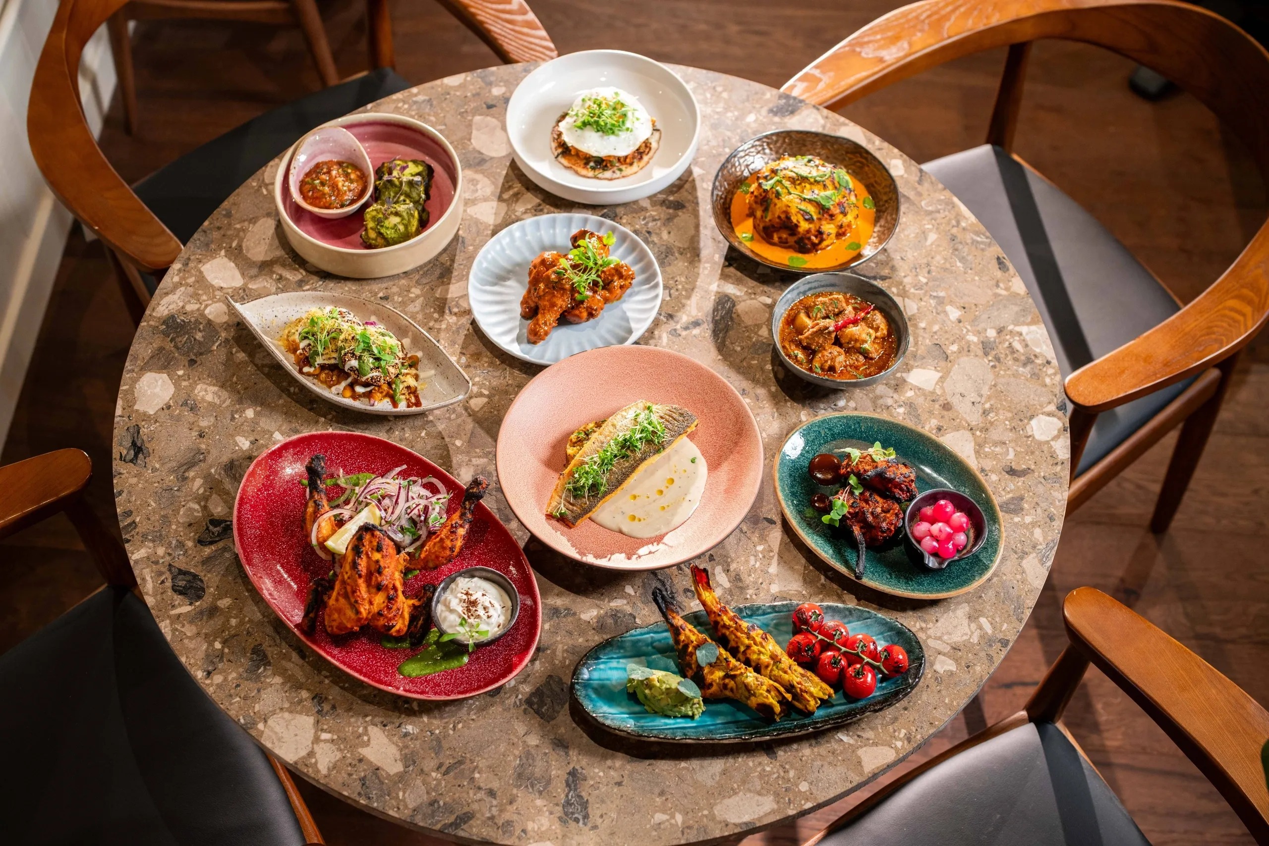 Table full of Indian food at KOKUM in East Dulwich.