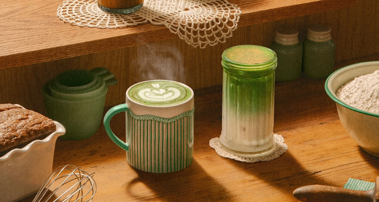 Blank Street matchas on a window pane. 