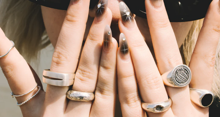 Girl with rings and sunglasses on from Stooki.