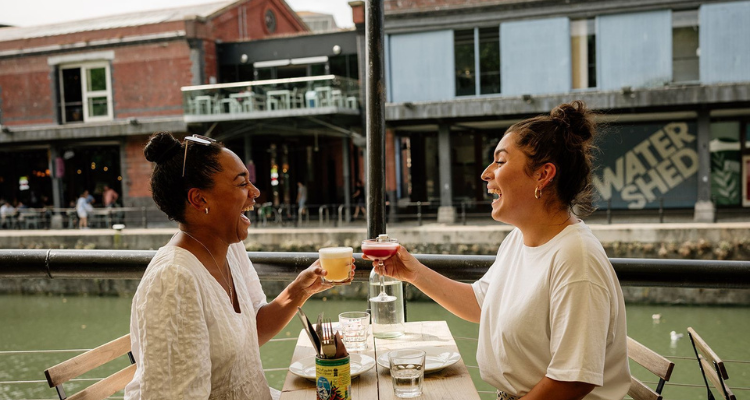 Two girls enjoying drinks at Under The Stars In Bristol.