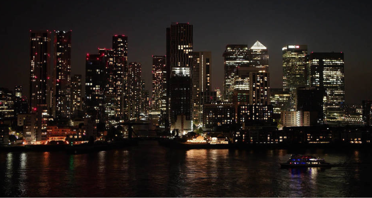 The London Skyline at night from the Thames riverbank