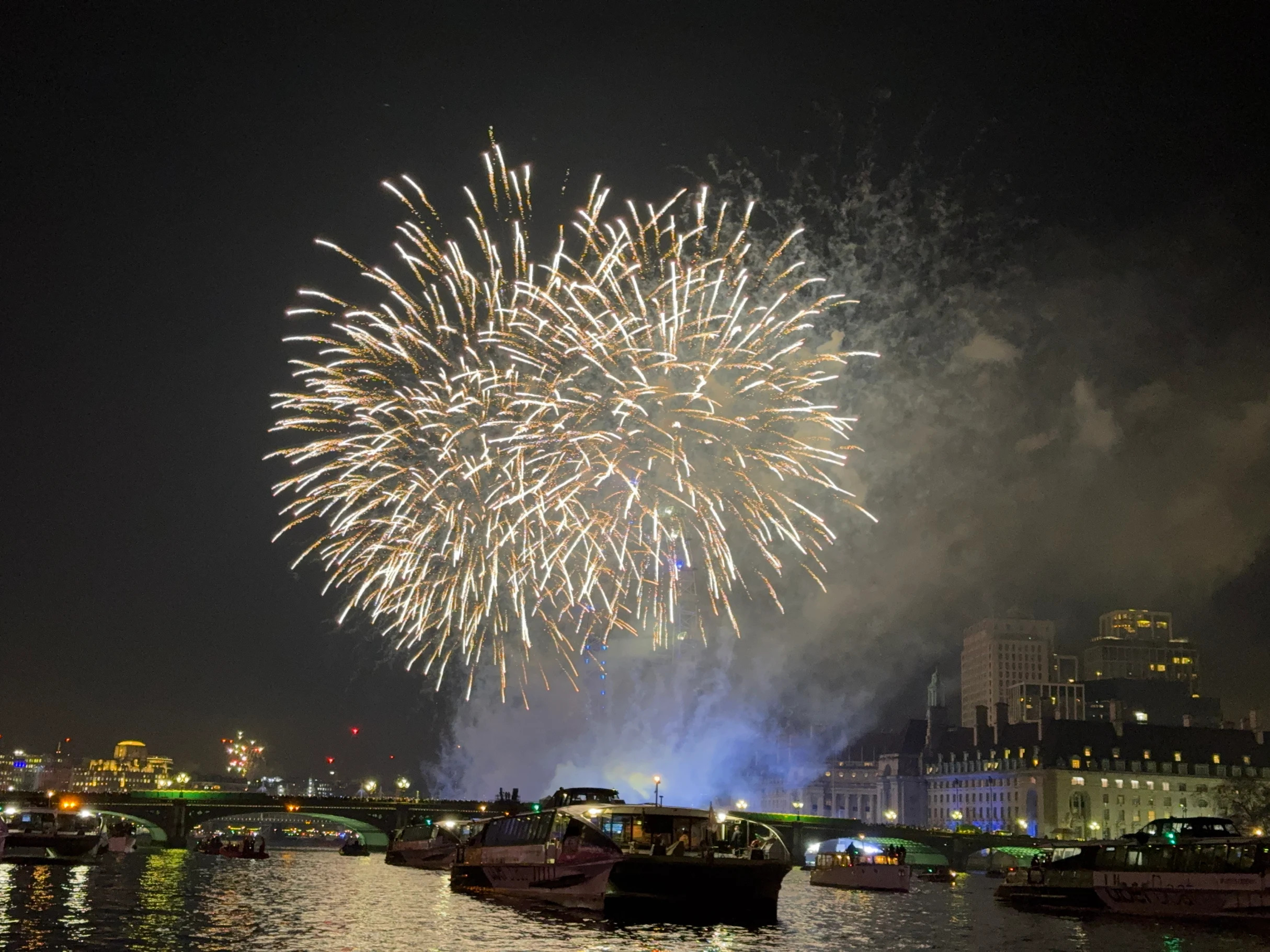Fireworks over the Thames in London on New Year's Eve from Capital Pleasure Boats.