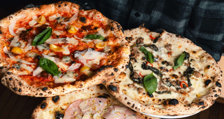 Three pizzas from Rudy's Pizza in Birmingham.