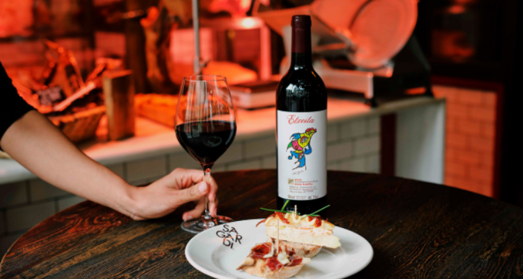 Sagardi wine and plate of pintxos. 