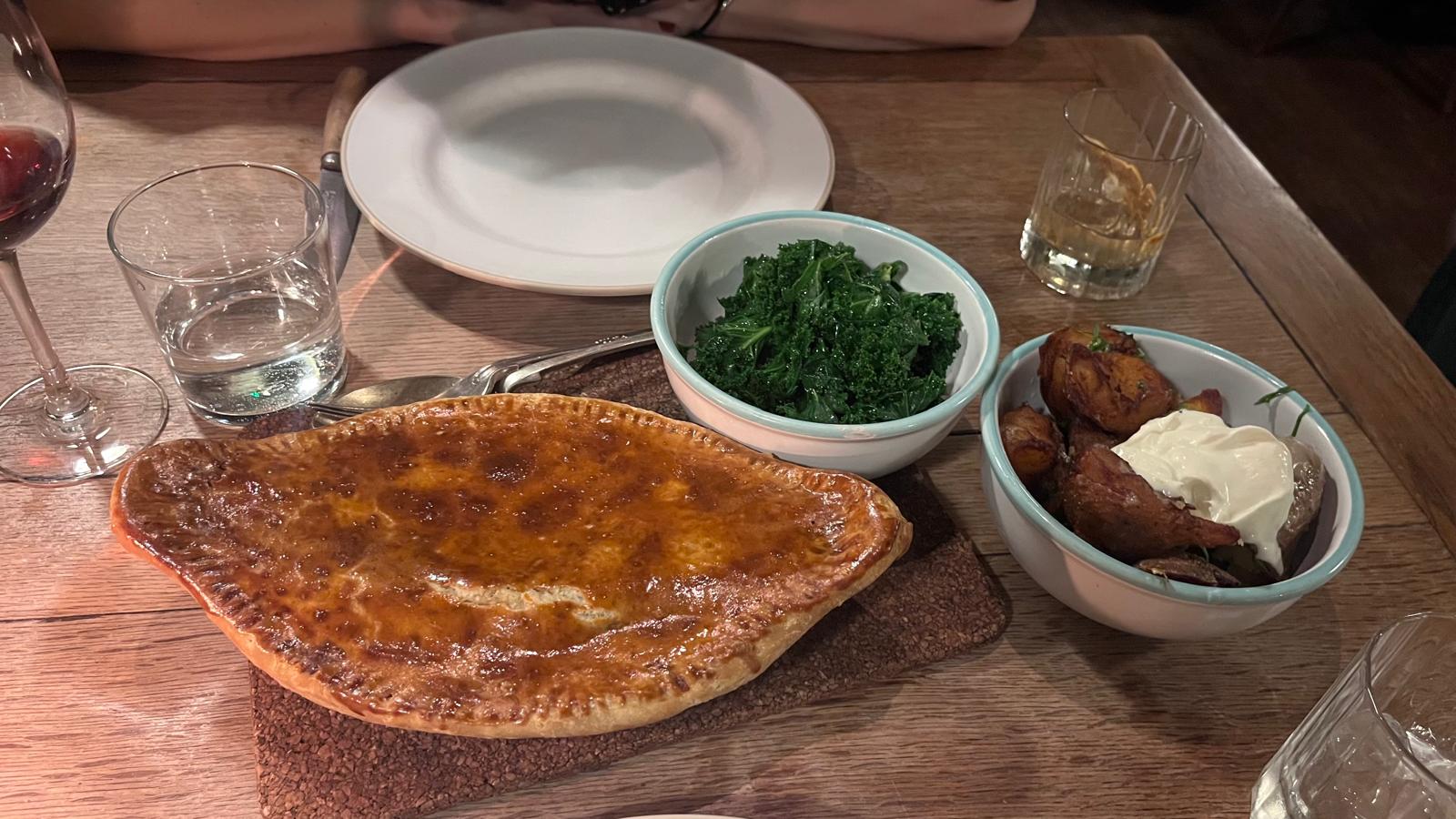 Beef and and beer pie with side of kale and potatoes.