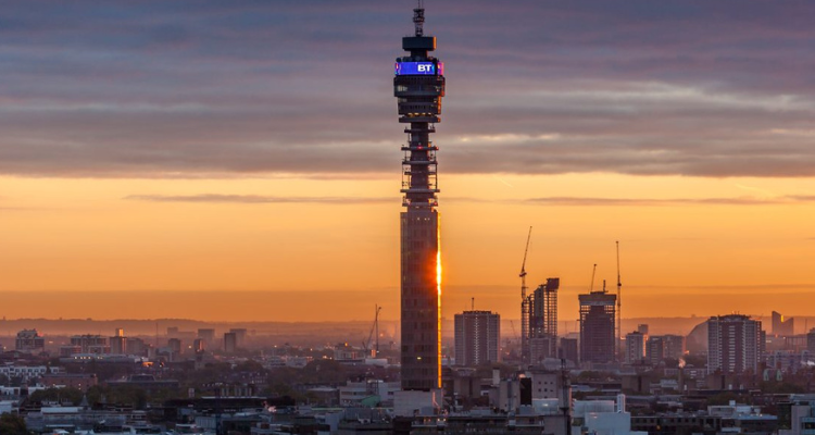 London's skyline focused on the BT tower at sunset.