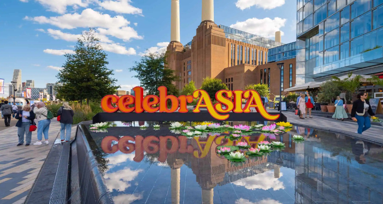 A large sign reading 'celebrASIA' in front of Battersea Power Station.