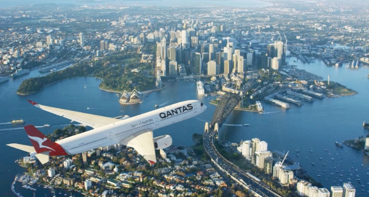 A Qantas plane flying over Sydney, Australia.