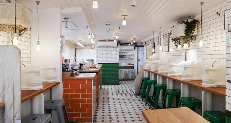 The interior of a coffee shop that was once a Victorian toilet.