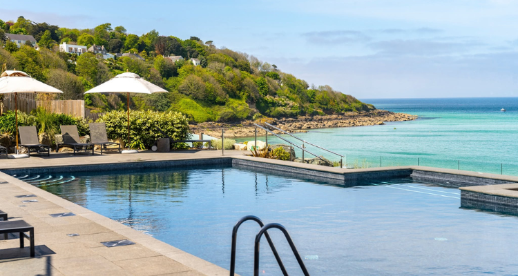 A small pool overlooking the blue waters of Carbis Bay.