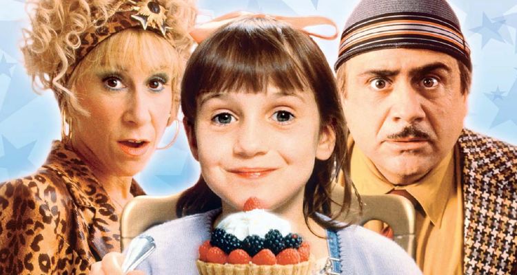Promotional photo of Matilda, the film from 1996, featuring actors Mara Wilson, Rhea Pearlman, and Danny Devito.