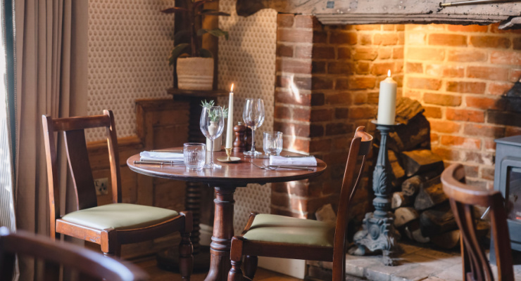 Candlelit table at The Crown Bidelston.