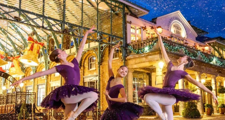 Dancers daning outside in the snow in Covent Garden.
