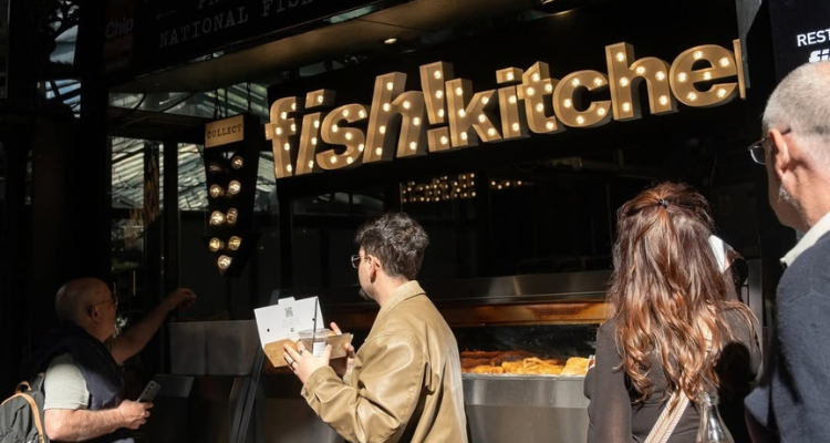 A busy fish and chip stand in Borough Market.