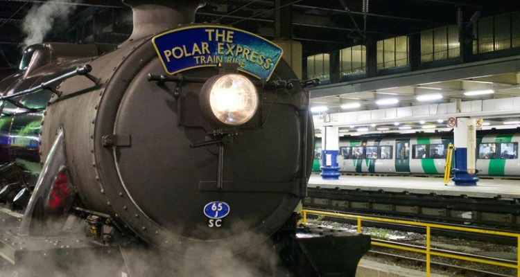 A black steam train that says 'The Polar Express.'